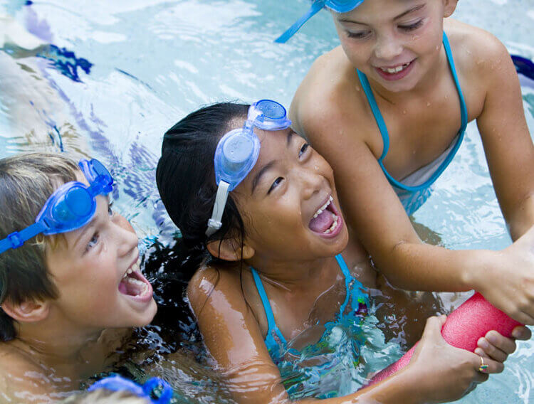 kids in a pool in smyrna apartments